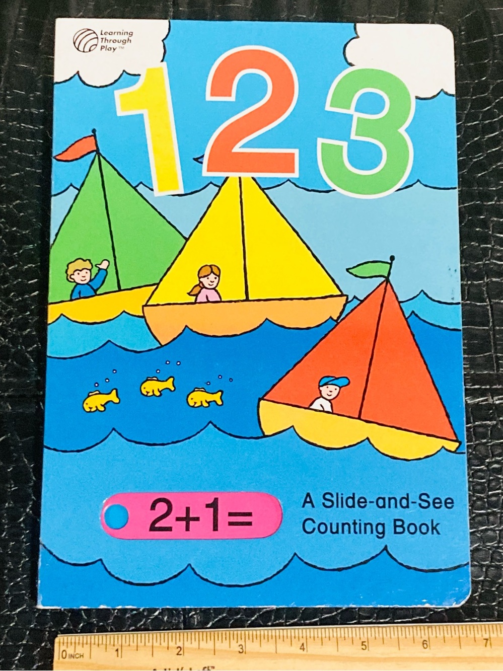 1-2-3 A Slide-and-See Counting Book by Learning Through Play